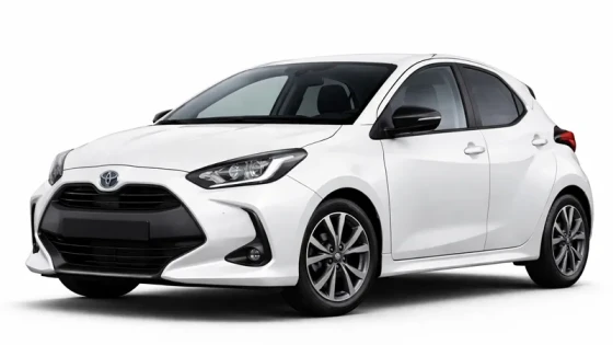 A white Toyota Yaris offered for rental by the company Imperial Car Rental.