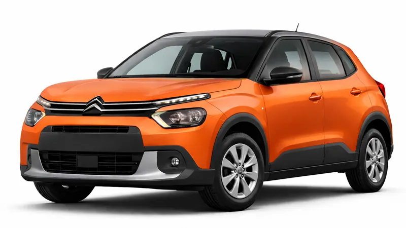 Πορτοκαλί συμπαγές SUV Citroën για ενοικίαση αυτοκινήτου με μοντέρνο σχεδιασμό και μαύρη οροφή.