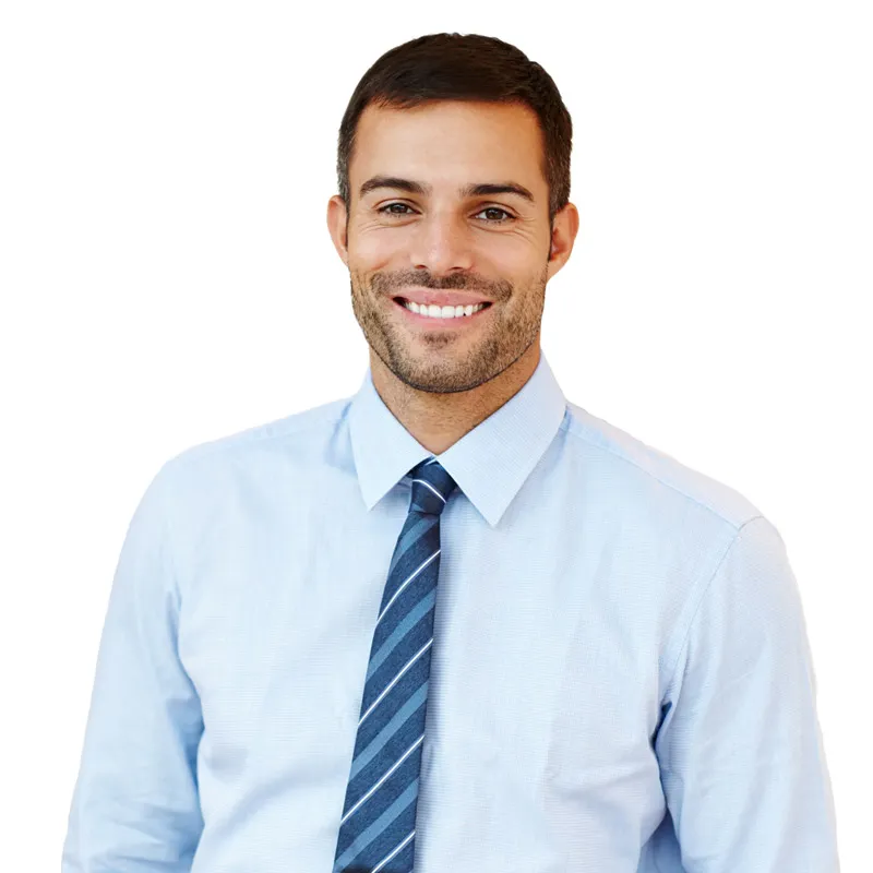 Smiling man in light blue shirt and striped tie ready to assist with car rental services.